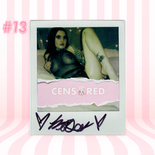 Polaroid-style photo with a person and text 'CENSORED' on a pink and white striped background.