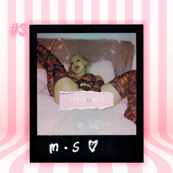 A Polaroid-style photo print centered on a pink striped background. The print shows a woman reclining on a white fluffy surface wearing sheer patterned stockings, with a torn-paper 'CENSORED' overlay and handwritten text at the bottom.