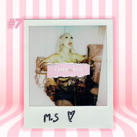 A Polaroid-style photo print centered on a pink striped background. The print shows a woman seated indoors with a torn pink label reading 'CENS*RED' across the middle, plus handwritten text 'M.