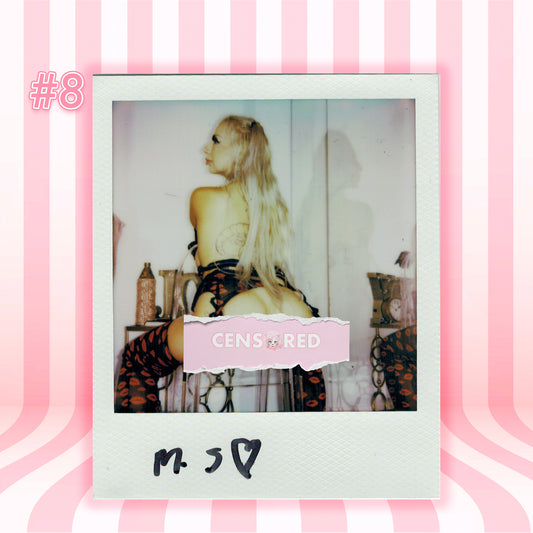 A Polaroid-style photo print centered on a pink striped background, showing a woman from behind wearing black lace-up lingerie with thigh-high stockings. A pink torn label across the photo reads 'CENSORED,' and the print has handwritten text at the bottom.