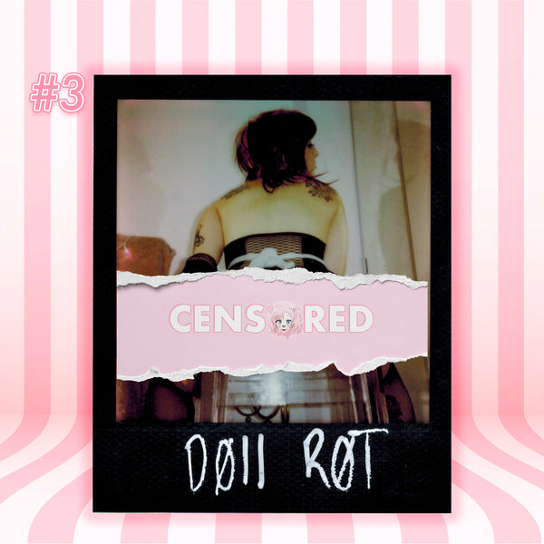 A Polaroid-style photo print centered on a pink striped background. The print shows a person from behind wearing a black and white striped top, with a torn pink banner across the middle reading 'CENSORED' and the text 'DOLL ROT' at the bottom.